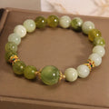 Women's jade green bracelet made from Xiuyan jade stone with adjustable cord