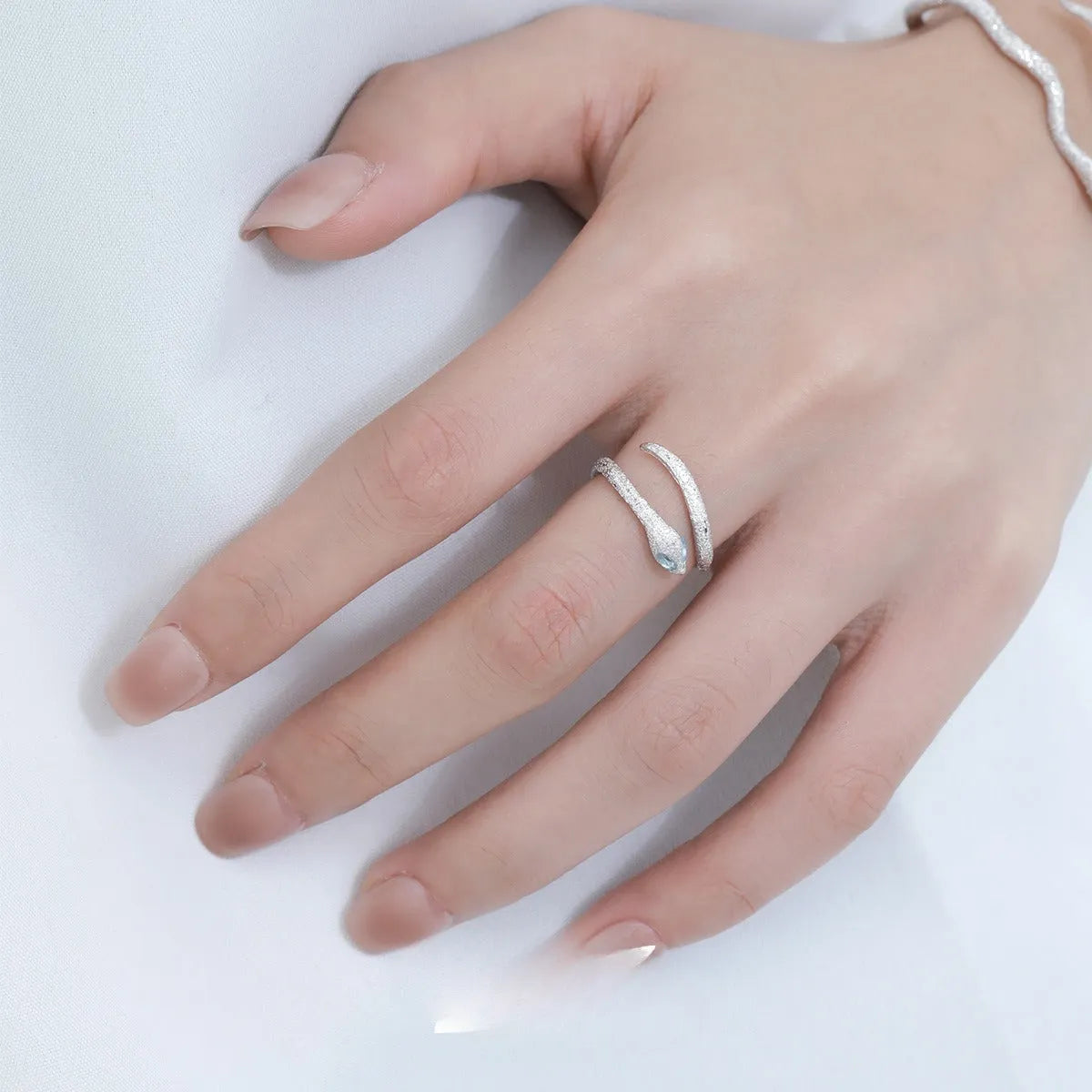 Adjustable opening snake design women's ring in platinum colour silver electroplated finish