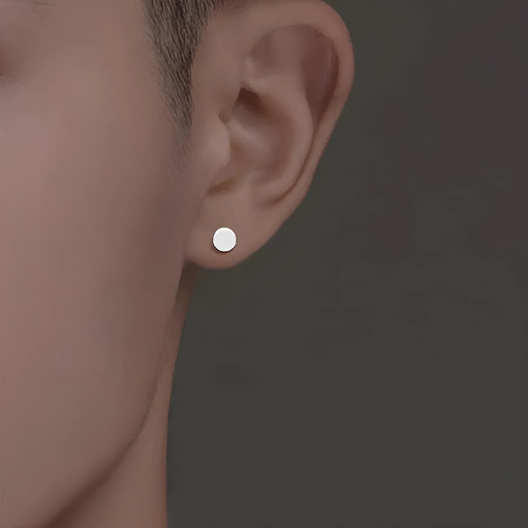 S999 sterling silver ear bone studs in silver and black colours with round geometric shape