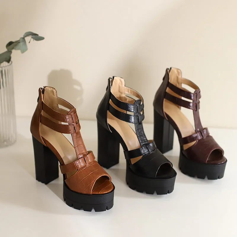 Platform high heel sandals in black with round toe, back zipper, and rubber sole