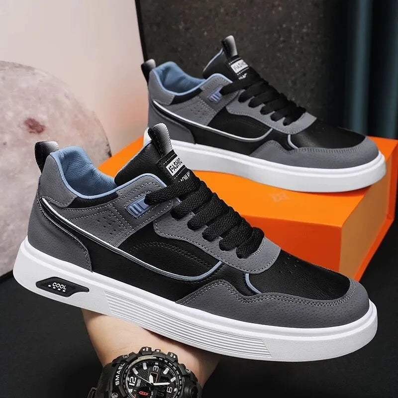 Men's low-top canvas board shoes in solid colours with leather stitching and mesh lining.