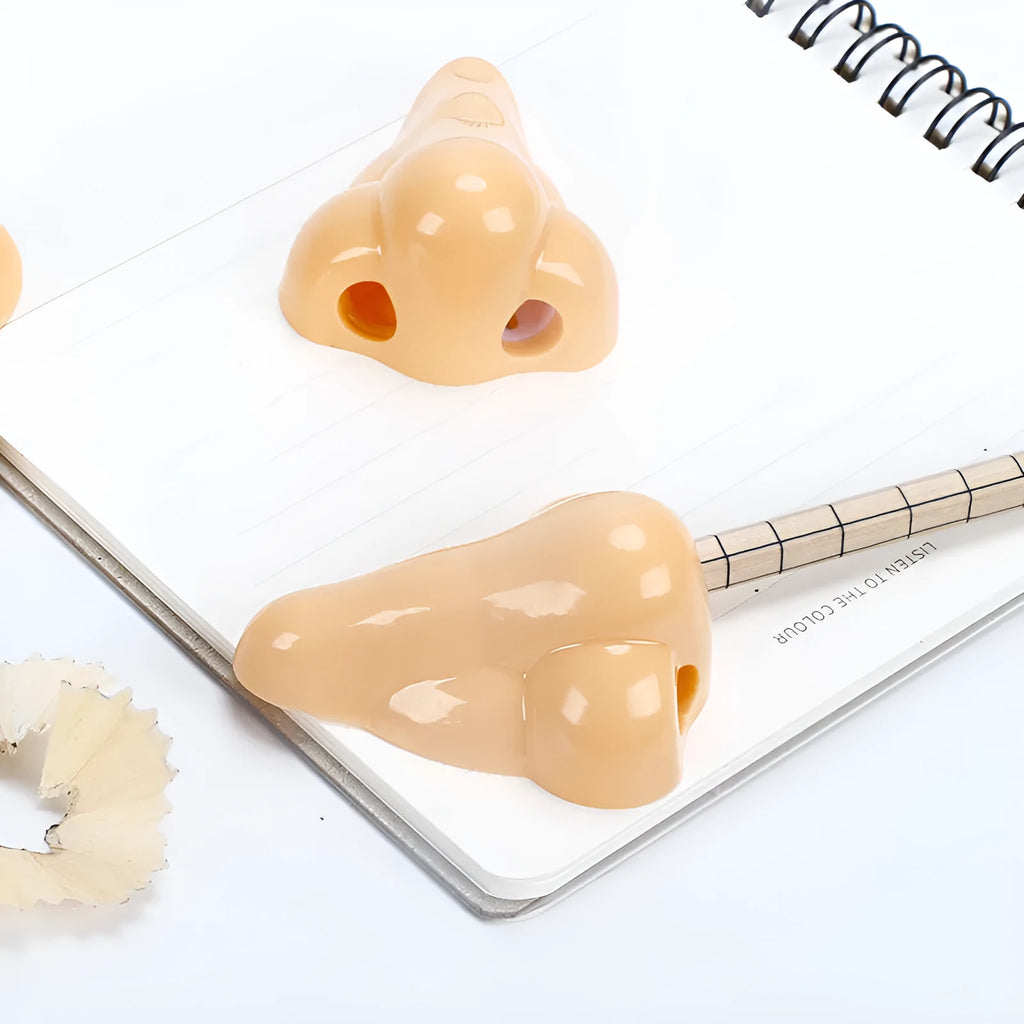 Flesh colour plastic pencil sharpener with big nostril design and geometry shape for student stationery