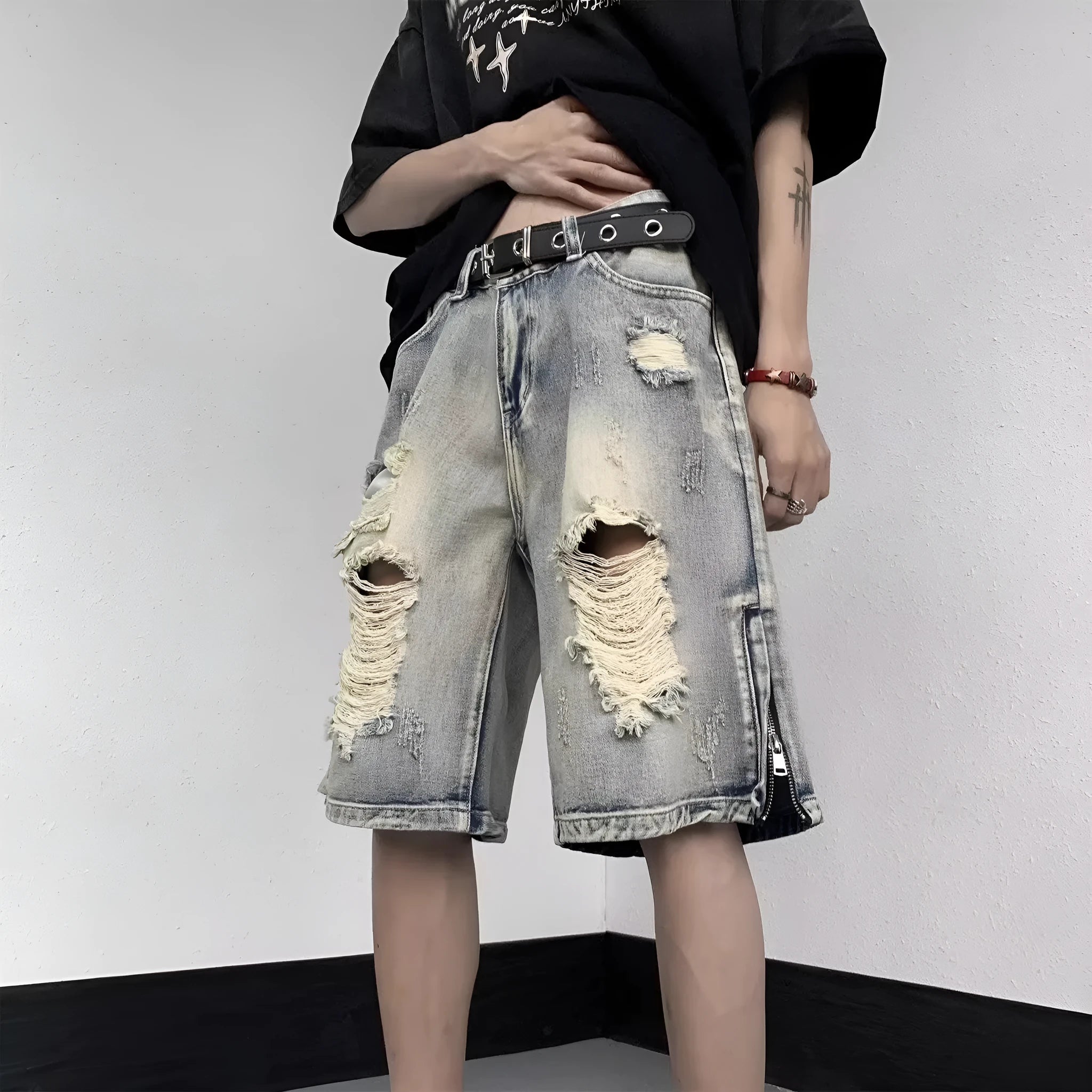 Blue retro tattered denim shorts with wide-leg loose fit for women, side view