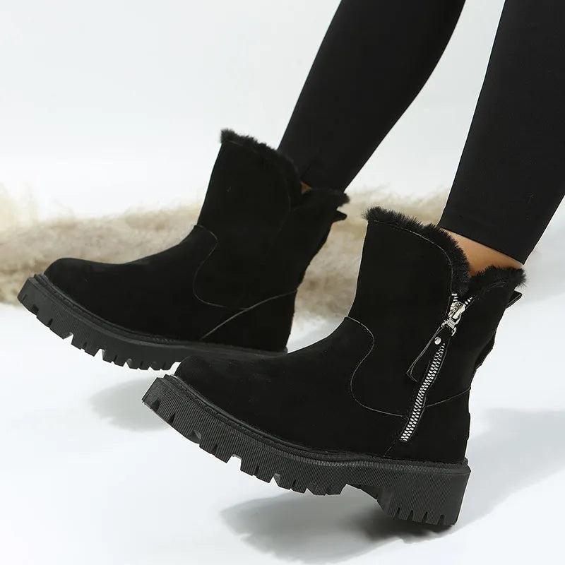 Women's black thick plush snow boots with faux suede upper, side zip, and non-slip rubber sole.