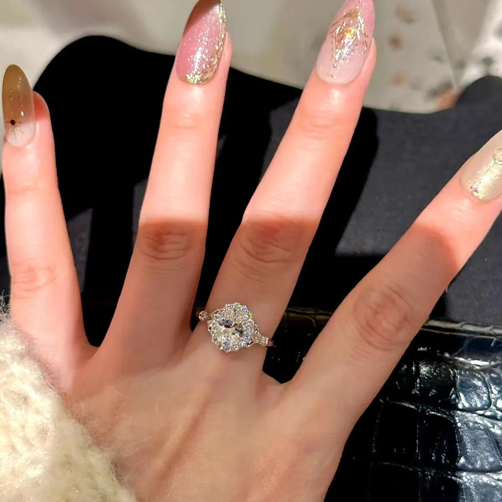 Silver adjustable geometric ring with diamond treatment and bridal bouquet design elements