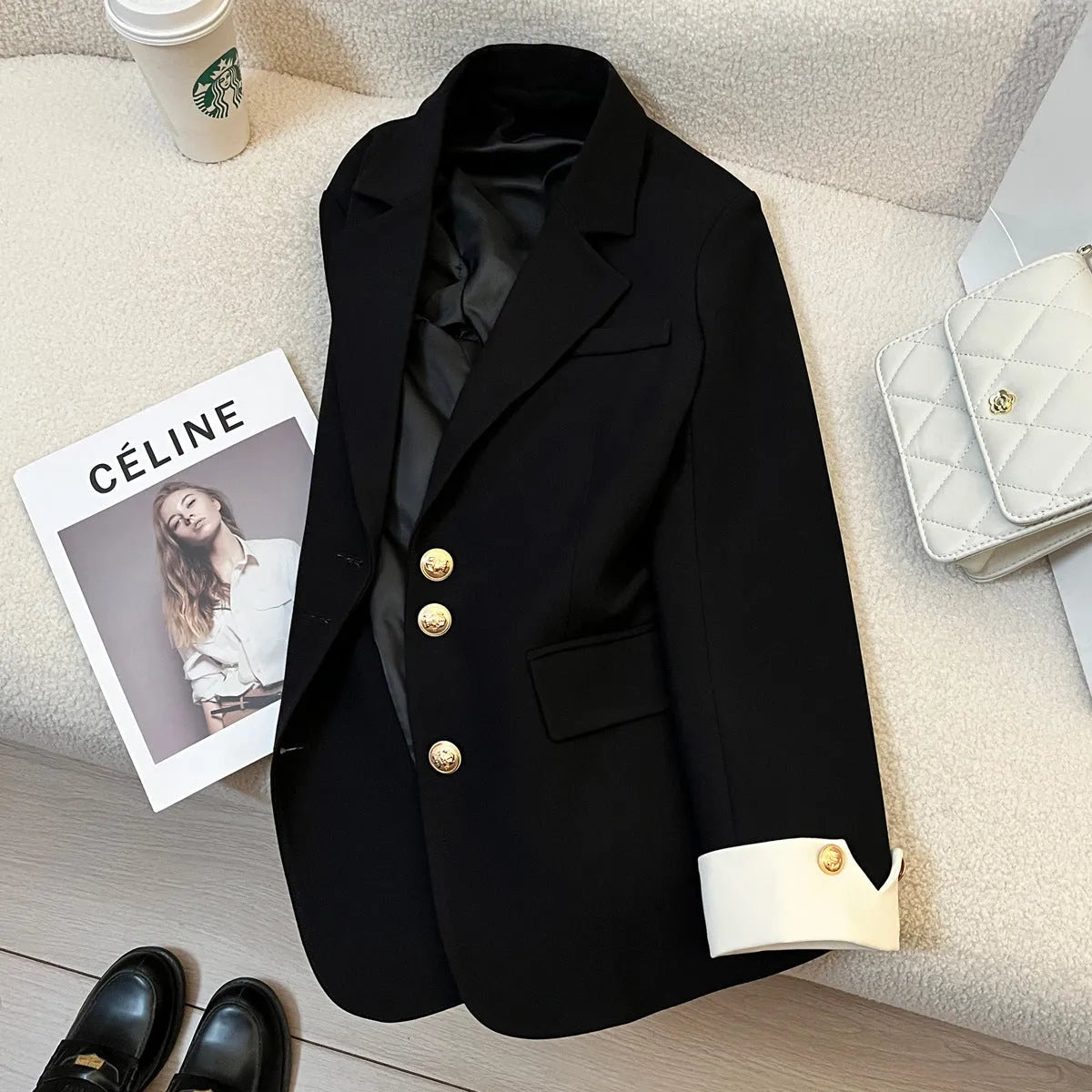 Korean style women's coat in loose fit with 65cm length and pockets in milky white colour