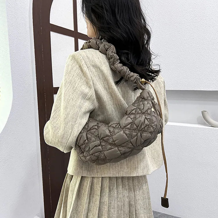 Women's nylon cloud underarm bag in beige colour with adjustable shoulder strap