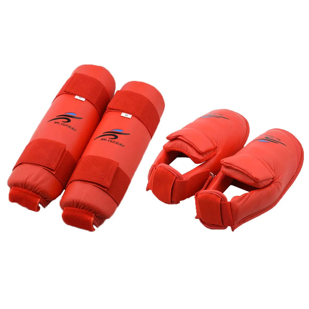 Complete martial arts protective gear set showing red boxing gloves, leg guards and helmet