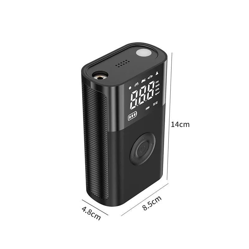 Handheld wireless digital display car tyre air pump with LED light and attachments on a grey background.