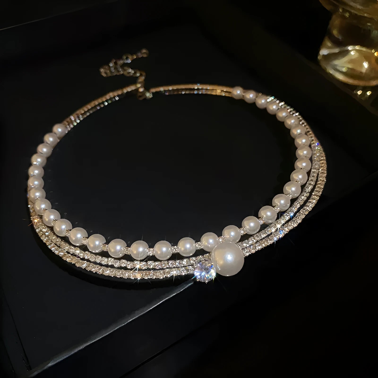 Silver curved geometric collar necklace for women emphasising collarbones