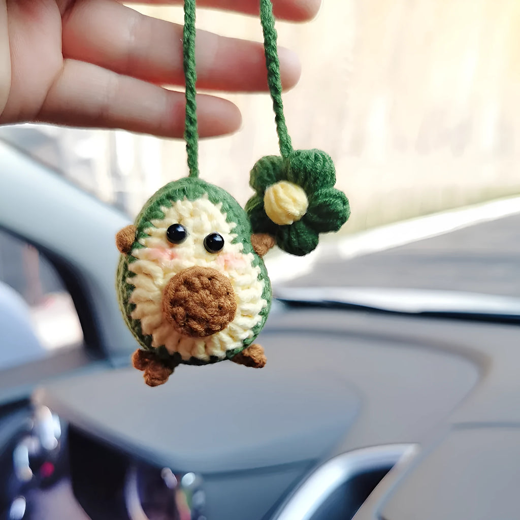 Handmade crocheted avocado rainbow flower car pendant in wool yarn for colourful vehicle interior decoration