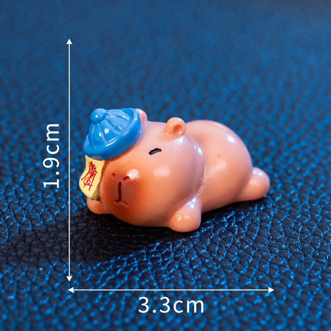 Micro landscape Halloween cute capybara resin decoration in pumpkin costume on a shelf
