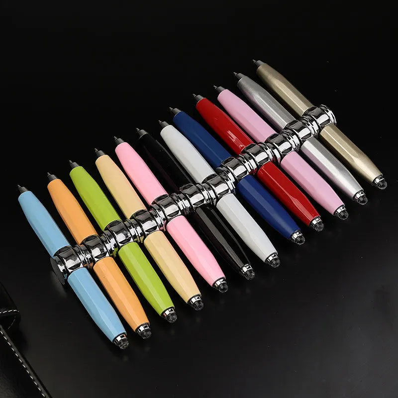 Metal ballpoint pen with LED spinning gyro function showing 10.5cm length and multiple colour refills