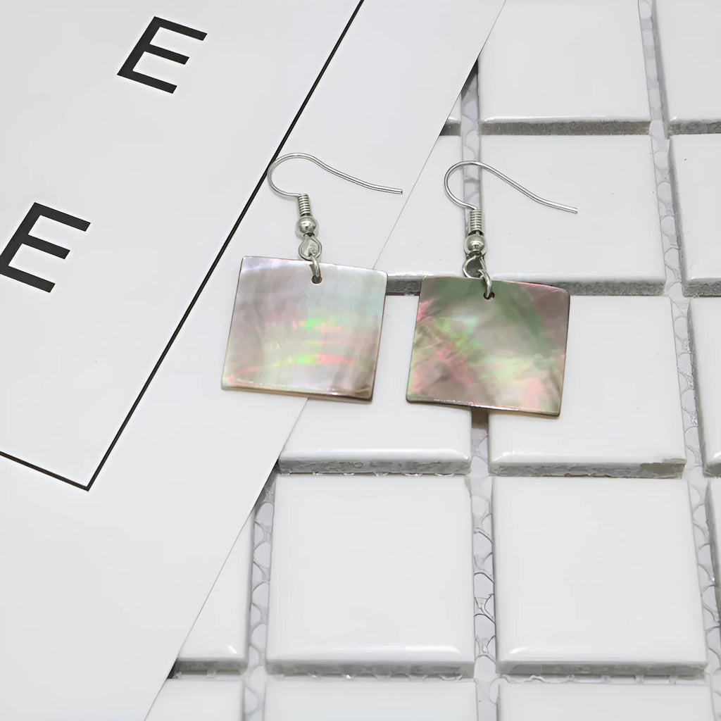 Women's geometric drop earrings made from real shell in square panther colour.