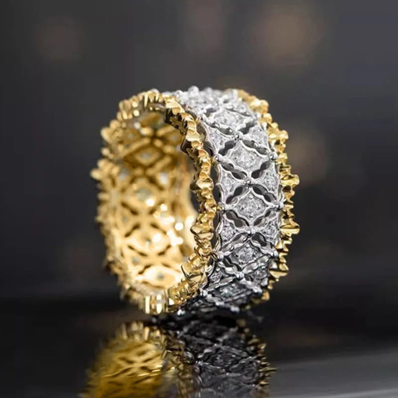 Geometric two-tone gold zircon ring with round elements on copper construction