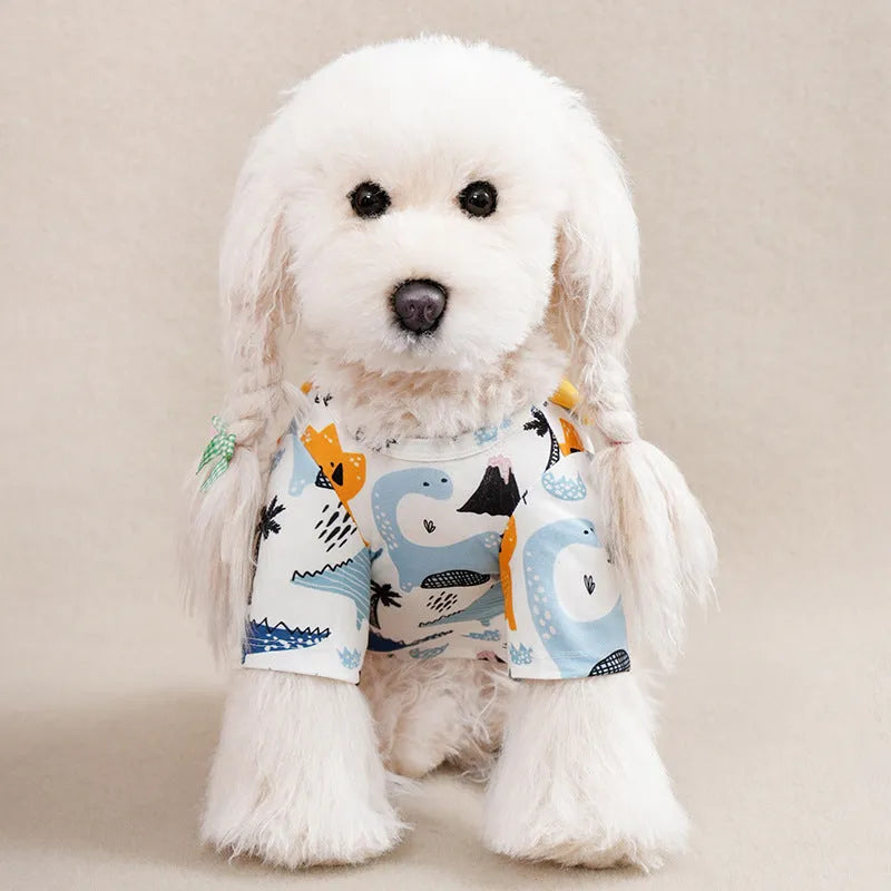 Small dog wearing printed polyester T-shirt with size chart showing bust and length measurements