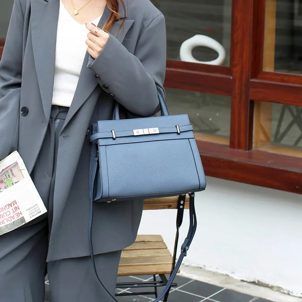 Genuine leather horizontal square shoulder bag with internal pockets in almond green colour.