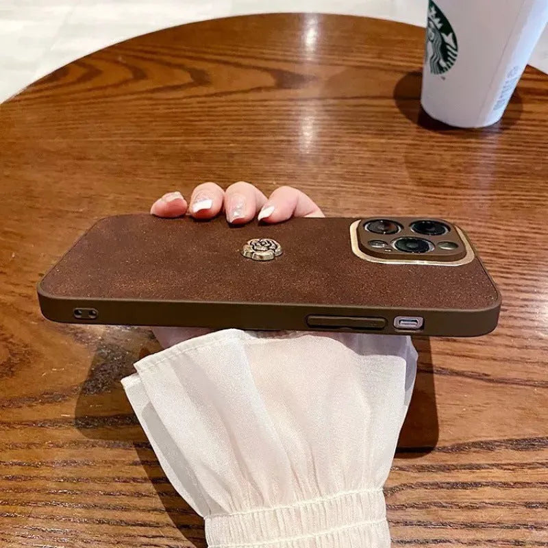 Brown frosted PC silicone phone case with camellia design for iPhone 11 to 15 series