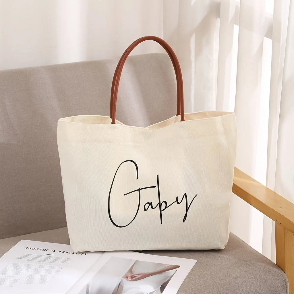 Cotton canvas tote bag with top handles and internal zip pocket in beige white colour option