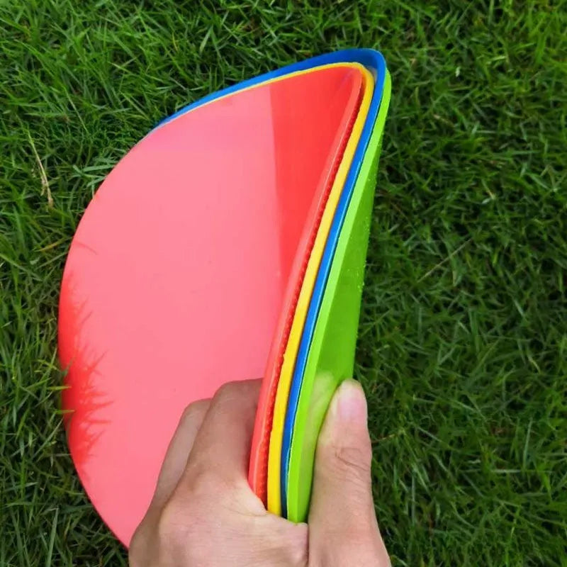 Soft TPE football training target pad measuring 23cm in diameter, available in six bright colours