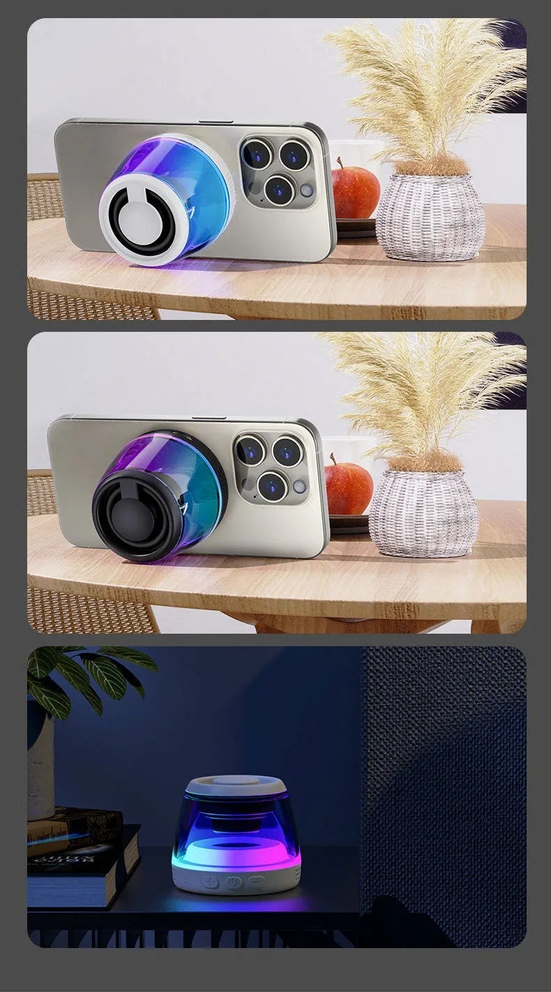 Black and white portable Bluetooth speaker with ambient lighting and magnetic base