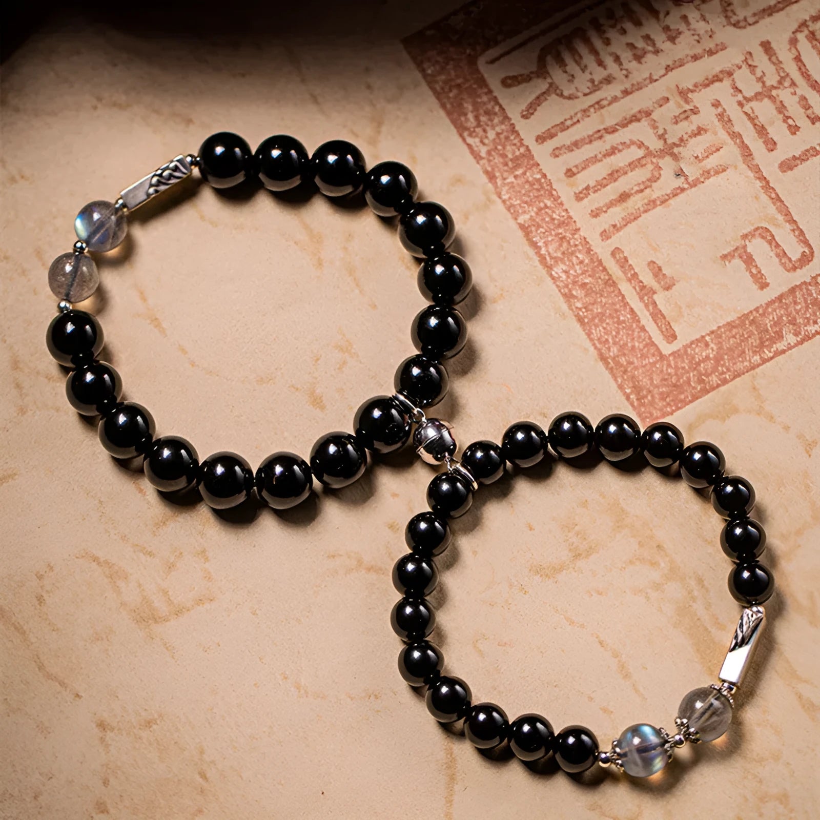 Obsidian Buddha beads couple bracelet DIY set showing 8mm and 10mm bead sizes