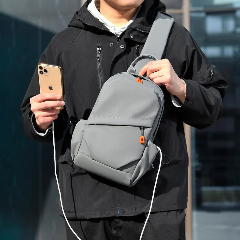 Men's black waterproof polyester crossbody bag with simple casual design