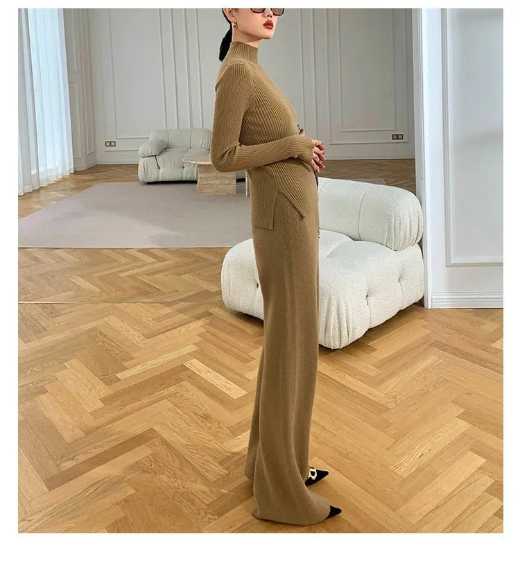Women's knitted three-piece set showing apricot coloured wide-leg trousers, sweater, and cardigan with leather stitching