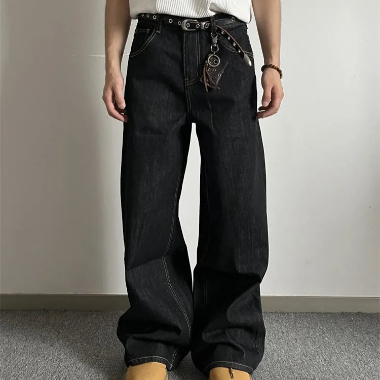 Black retro straight-leg jeans with wide-leg design on hanger