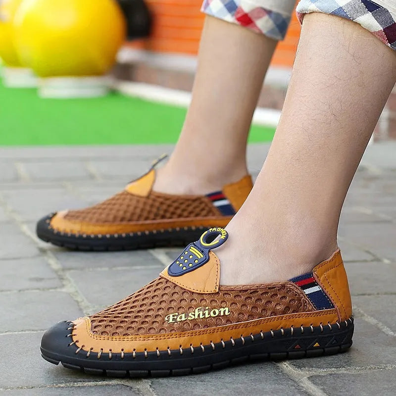 Men's brown casual mesh shoes with a rounded toe and sewn rubber sole.