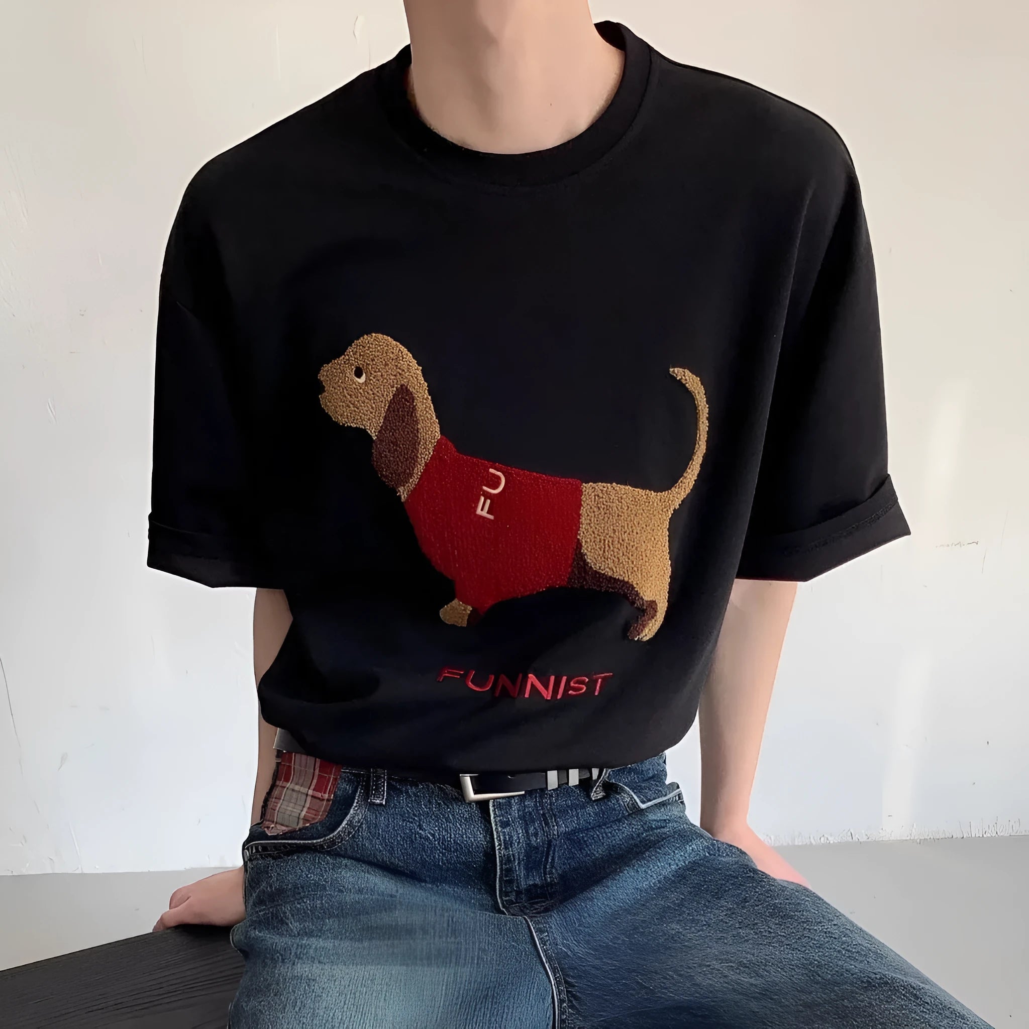 Men's grey cotton t-shirt with embroidered dachshund dog design on the front.