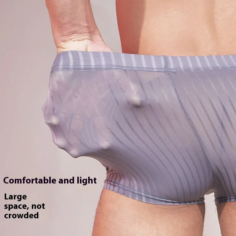 Men's striped underwear in thin nylon fabric, shown in black, dark grey, and white colours.