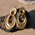 Women's gold French retro double circle earrings with a U-shape in quicksand colour on a copper base.