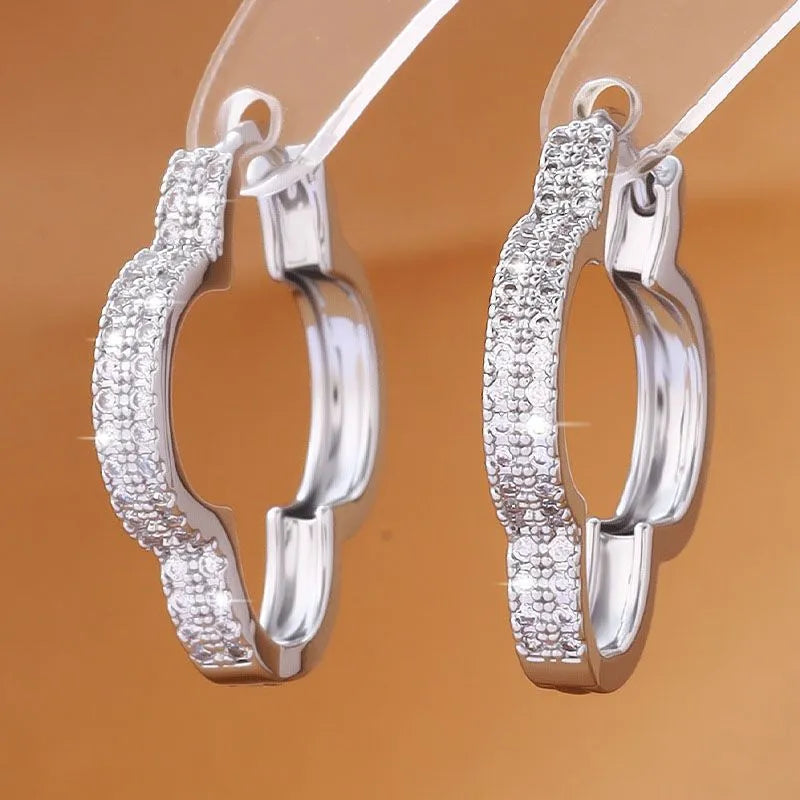 Heart-shaped earrings with micro-inlaid zirconia in gold copper finish for women