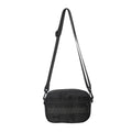 Men's nylon messenger bag in black showing street trend styling with sewing thread details and crossbody strap