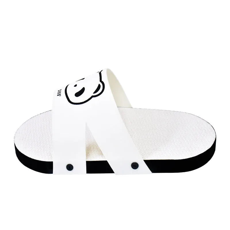 White corrugated paper cat scratch board with slipper design on flat surface