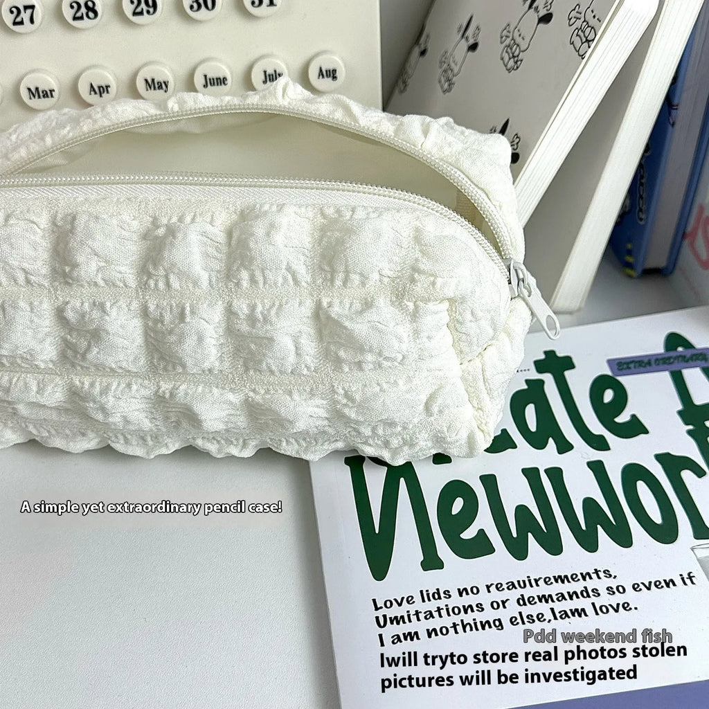 Fabric pencil case with Fashion Personality Cream Puff design in beige and black colour options