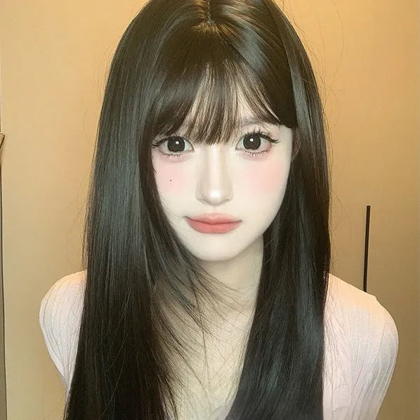 Dark brown long straight hair wig with bangs on a wig stand, full-head design, high temperature fibre