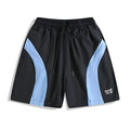 Men's black and grey quick-drying sports shorts with elastic waist and contrast colour panels for training