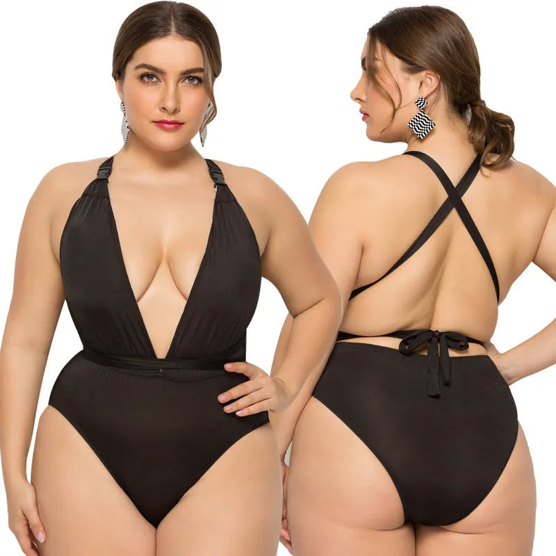 Plus size woman in black high elasticity backless one-piece swimsuit with chest pad solid colour for swimming fitness