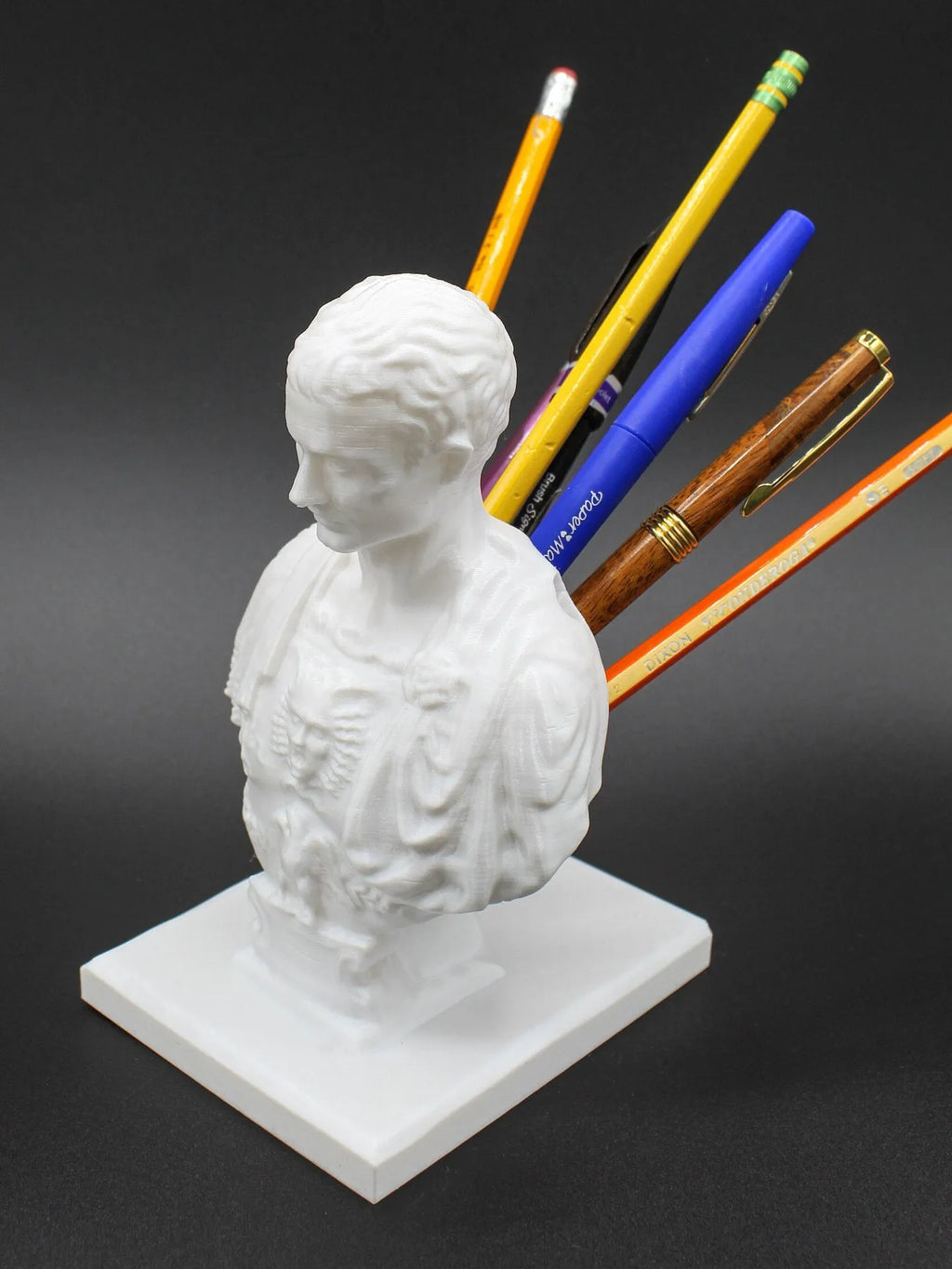 White American character modelling pen holder for desk organisation