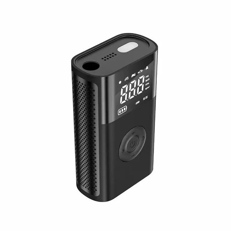 Handheld wireless digital display car tyre air pump with LED light and attachments on a grey background.