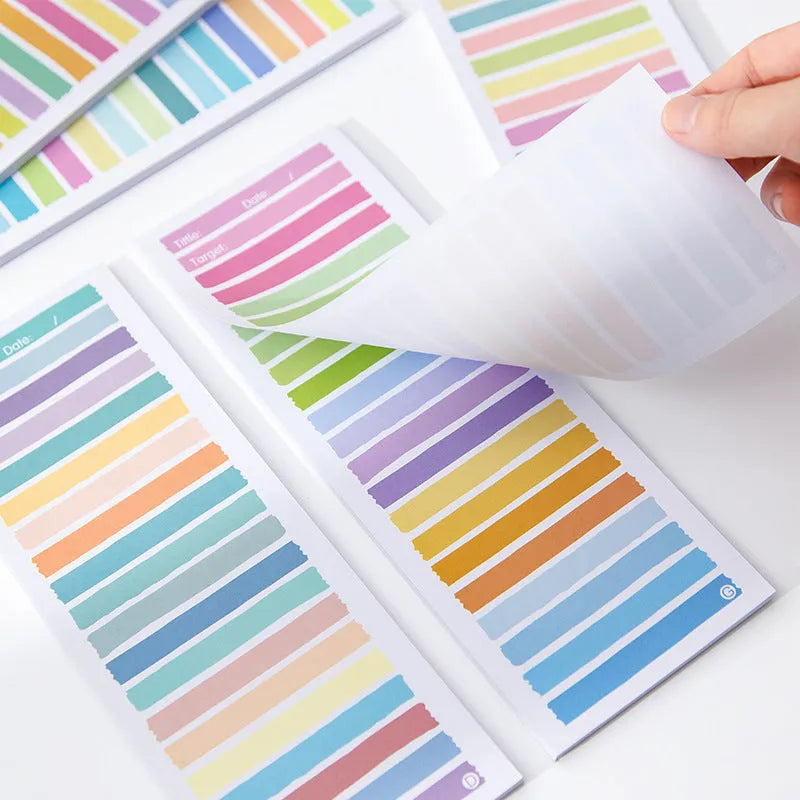 Colourful cartoon student notepad with plastic storage box showing sticky note paper inside