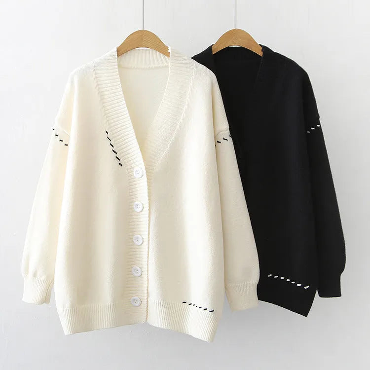 Women's loose fit knitted cardigan coat in solid black colour with long sleeves
