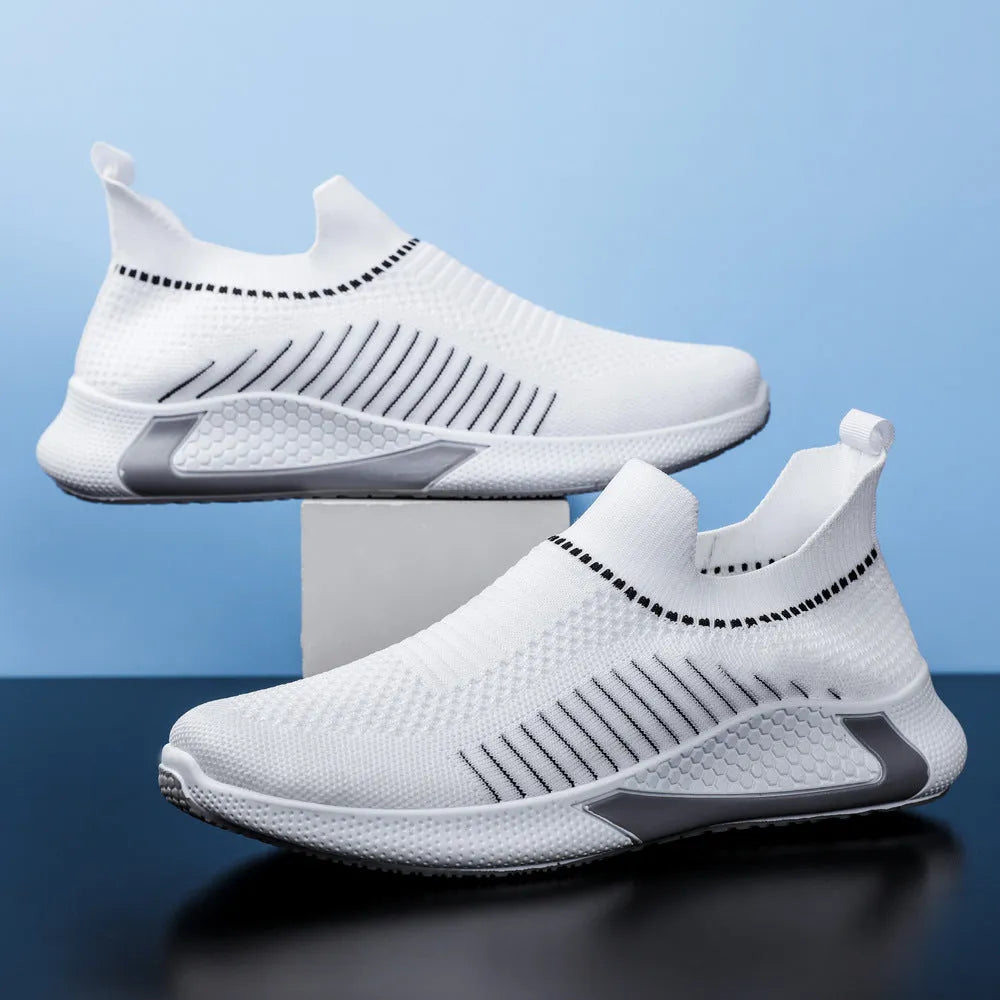 Men's striped mesh slip-on sneakers with lace-up front in black, white, and black/white colour options