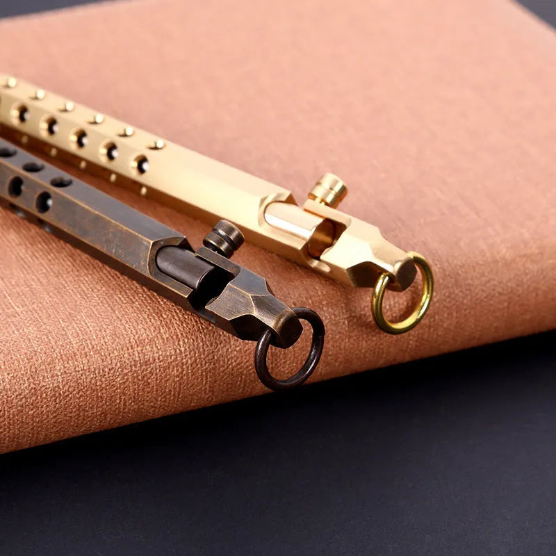 Hexagonal brass bolt action pen showing six-sided barrel and bolt mechanism