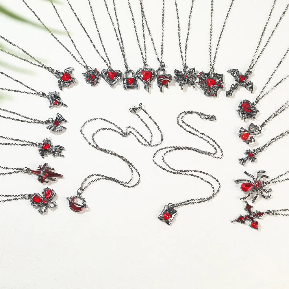 Halloween necklace with spider, bat, and skull wing charms on a zinc alloy chain