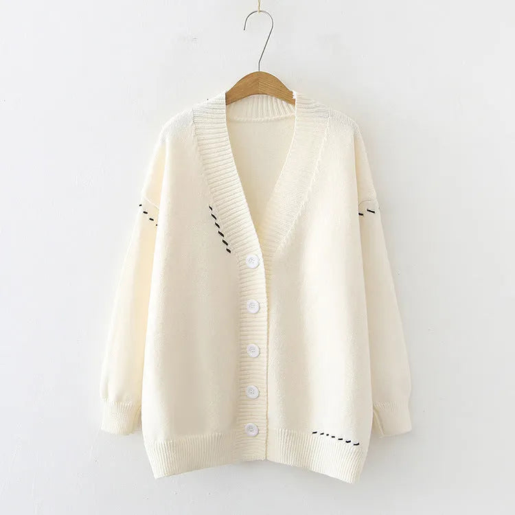 Women's loose fit knitted cardigan coat in solid black colour with long sleeves