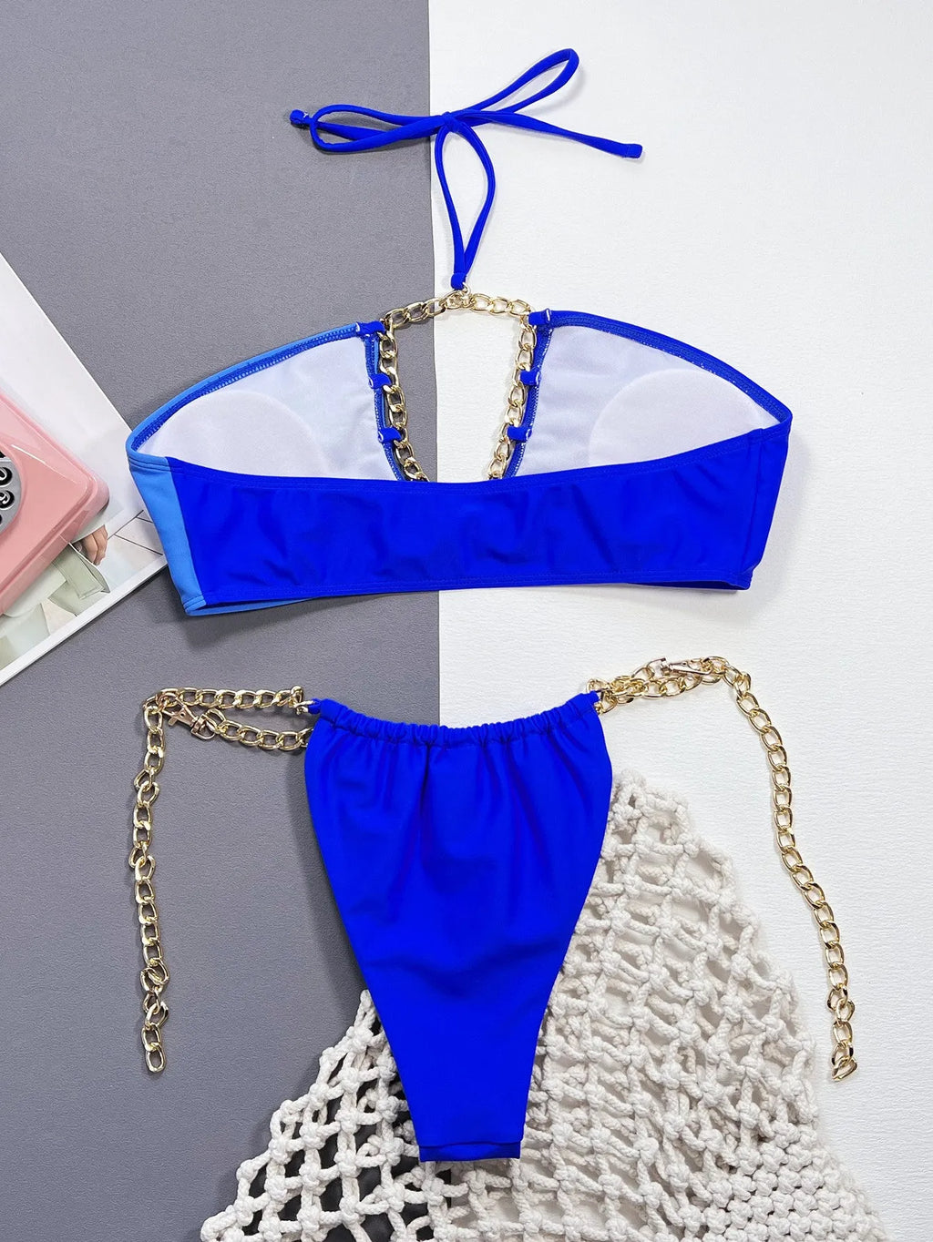 Women's blue nylon split bikini set top and bottom on display