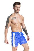 Men's blue polyester sports shorts with lace-up front and padding for athletic activities